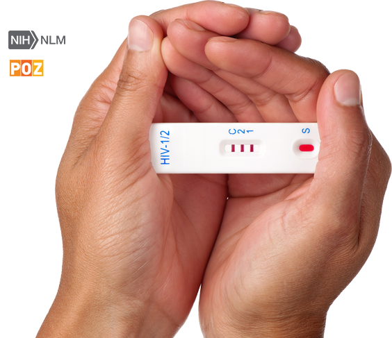 2 hands holding a HIV test